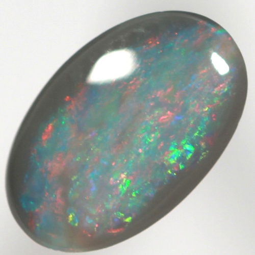 SOLID BLACK OPAL Bright blood red over greens